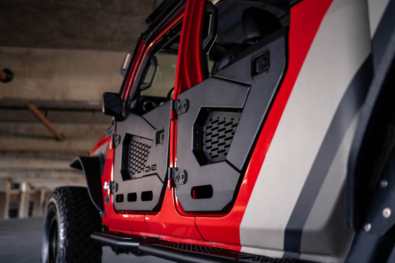 DV8 Offroad 18-22 Jeep Wrangler JL/JT Spec Series Half Doors - Rear Set on red Jeep with mesh panels for offroad performance.
