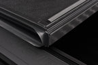 Close-up detail of BAK 14-18 Chevy Silverado 1500 / 15-20 Chevy Silverado 2500/3500 6ft 6in Bed BAKFlip G2 truck bed cover.