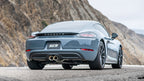 Borla 17-22 Porsche Cayman/Boxster 718 2.0L 4 Cyl. AT/MT RWD 2DR 2.25in S-Type Exhaust on a gray Porsche.