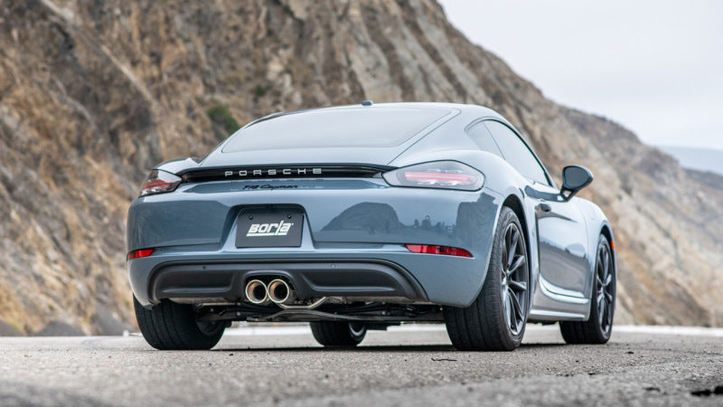 Borla 17-22 Porsche Cayman/Boxster 718 2.0L 4 Cyl. AT/MT RWD 2DR 2.25in S-Type Exhaust on a gray Porsche.
