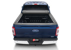 BAK 21-22 Ford F-150 (Incl. 2022 Lightning) Revolver X4s 5.7ft Bed Cover installed on a blue Ford truck