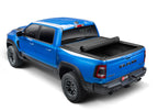 BAK 09-18 Dodge Ram (19-21 Classic) Revolver X4s 8ft Bed Cover on blue truck