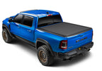 BAK 19-24 Dodge Ram (w/o Ram Box) Revolver X4ts 5.7ft Bed Cover w/T-Slot Rails on blue truck