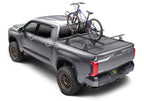 Retrax 2007-2020 Toyota Tundra CrewMax 5.5ft Bed RetraxPRO XR with Deck Rail System on offroad truck with bike