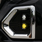 Baja Designs 19+ GMC 1500 S1 Fog Pocket Mount Kit Clear Spot / Amber Wide Cornering lighting on black truck