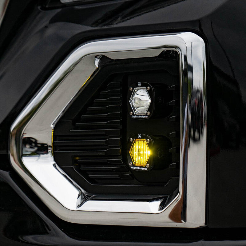 Baja Designs 19+ GMC 1500 S1 Fog Pocket Mount Kit Clear Spot / Amber Wide Cornering lighting on black truck