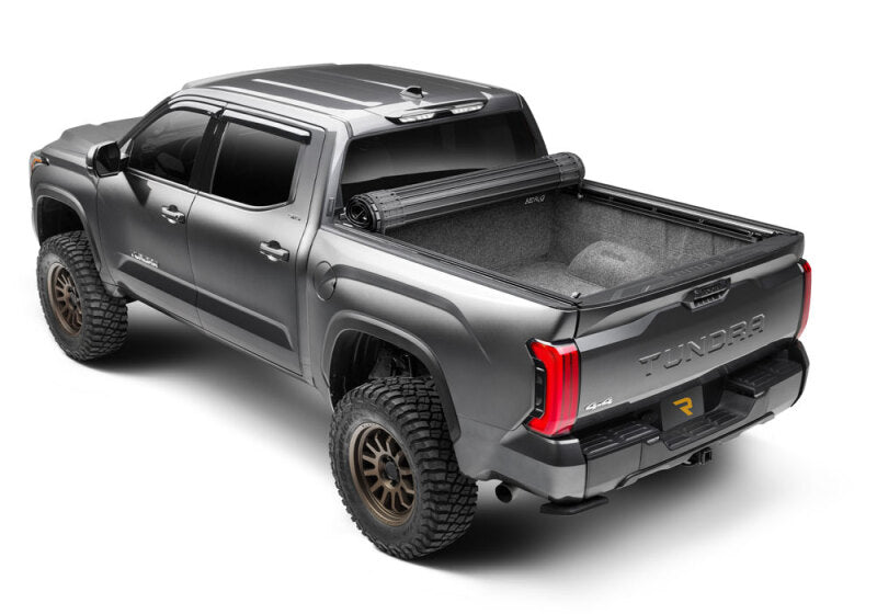 BAK 22-24 Toyota Tundra Revolver X4ts 5.6ft Bed w/T-Slot Rails with offroad wheels and truck exterior accessories.