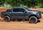N-Fab RKR Rails 16-17 Toyota Tacoma Double Cab - Tex. Black - 1.75in. on off road terrain with performance offroad parts