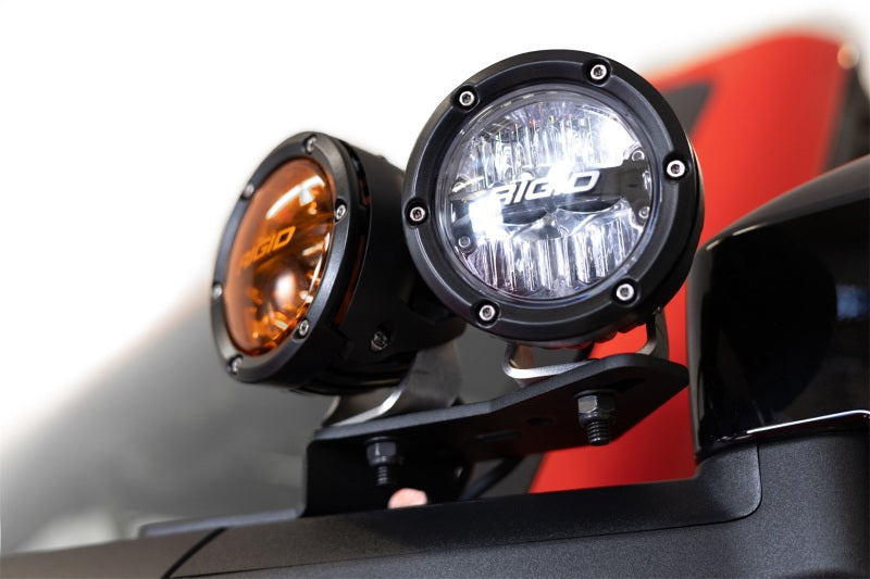 Addictive Desert Designs21-23 Ford Bronco/Raptor Dual Ditch Light Brackets with amber and clear pod lights.