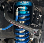 Camburg Toyota Tundra 2WD/4WD 22-23 1.25in Performance Uniball Upper Arms (w/ covers) installed with off road parts.