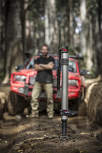 ARB Hydraulic Recovery Jack in off-road environment with vehicle