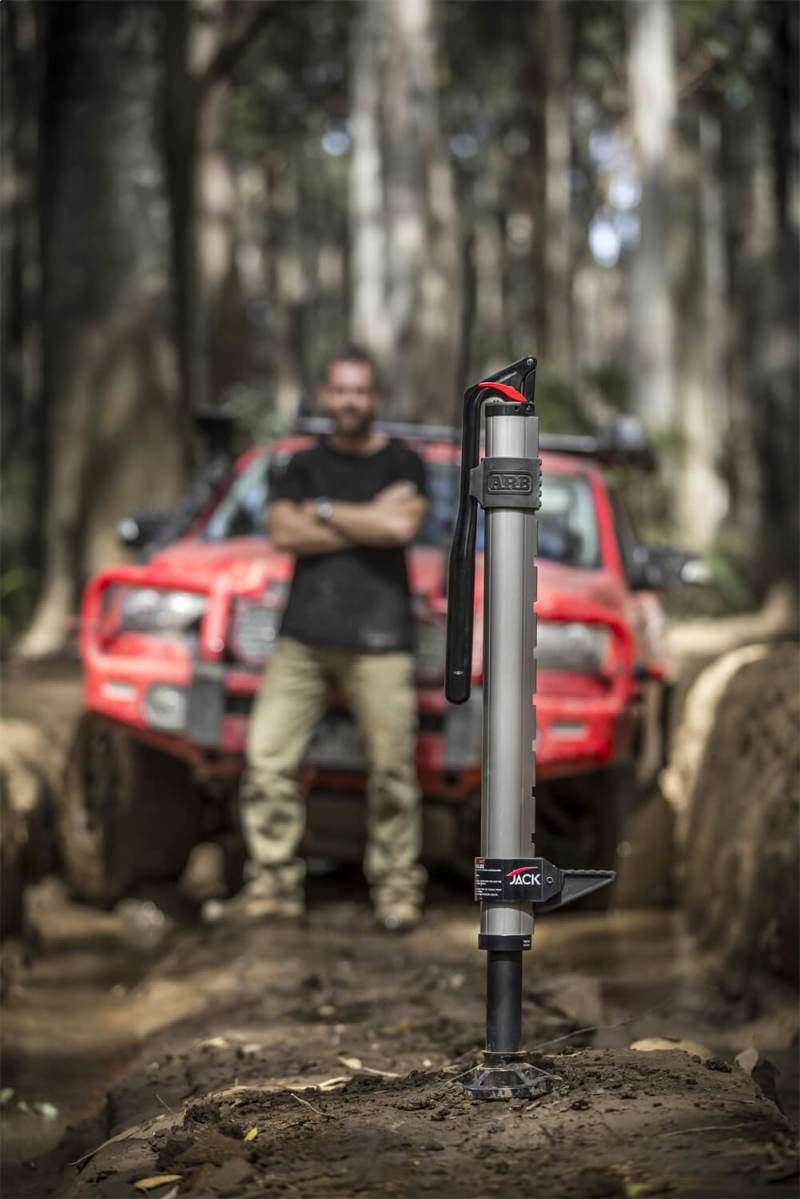 ARB Hydraulic Recovery Jack in off-road environment with vehicle
