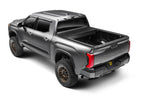 Retrax 2024 Ford F-150 SuperCrew/Super Cab 5.5ft. Bed Retrax EQ with offroad tires and exterior accessories for trucks.