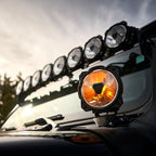 KC HiLiTES Gravity Titan LED 6in. - Pair Pack (SAE Driving Beam) mounted on Jeep.