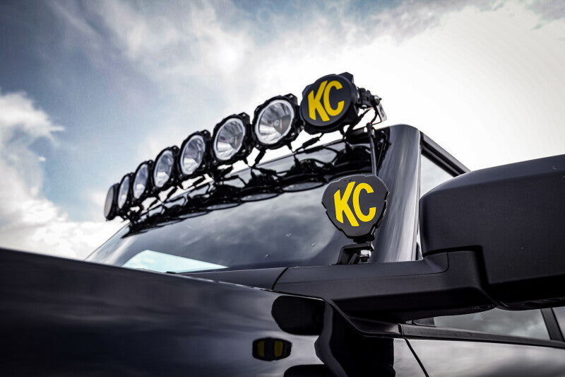 KC HiLiTES 2021+ Ford Bronco Ditch Light Mounting Bracket Set on vehicle roof with off-road lights