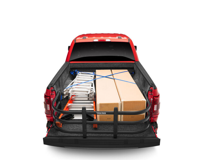 AMP Research 04-22 Ford F-150 (Excl. 04 Heritage) / 07-21 Toyota Tundra Bedxtender HD Max - Black in truck bed with cargo