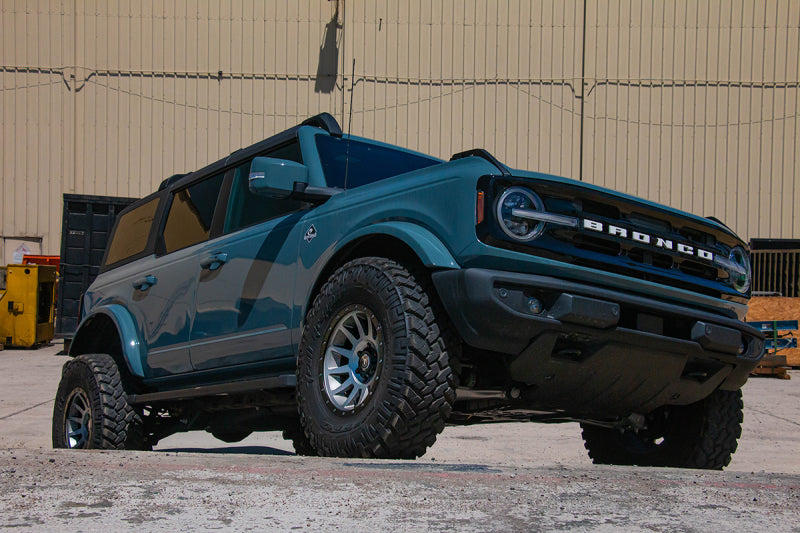 ICON Compression 17x8.5 6x5.5 25mm Offset 5.75in BS 95.1mm Bore Titanium Wheel on lifted Bronco
