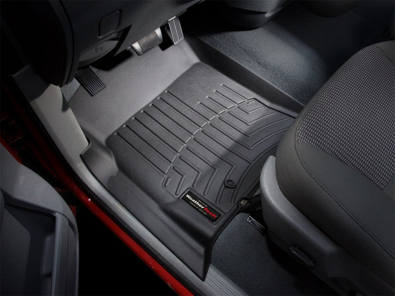WeatherTech 02-06 Dodge Ram 1500 Pickup QuadCab Front FloorLiner - Black in vehicle interior