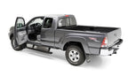 AMP Research 2016-2017 Toyota Tacoma Double Cab/Access PowerStep - Black in use on grey truck