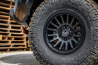 ICON Recon SLX 17x8.5 6x5.5 BP 25mm Offset 5.75in BS 95.1mm Bore Satin Black Wheel on offroad tire