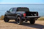 BAK 2024 Ford Ranger BAKFlip MX4 5ft Bed - Hard Folding truck bed cover with offroad wheels.