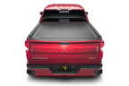 BAK 2020 Chevy Silverado 2500/3500 HD 6ft 9in Bed Revolver X2 truck bed cover on red Chevrolet Silverado.