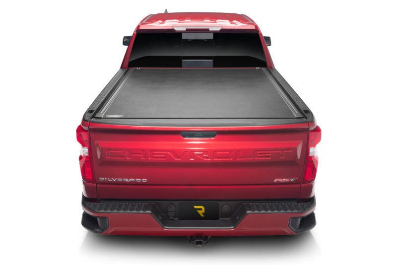 BAK 2020 Chevy Silverado 2500/3500 HD 6ft 9in Bed Revolver X2 truck bed cover on red Chevrolet Silverado.