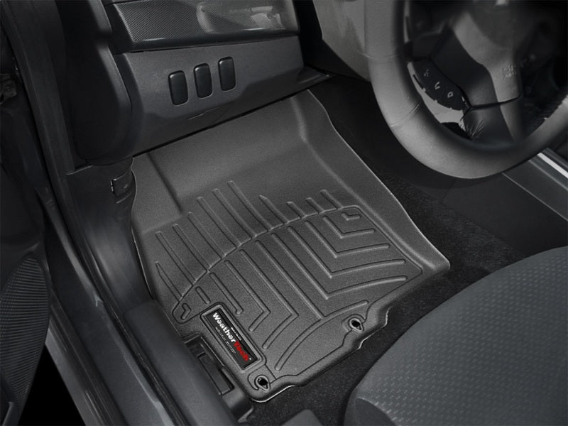 WeatherTech 08+ Mitsubishi Lancer Front FloorLiner - Black in vehicle interior