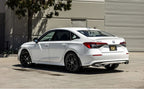 Magnaflow 2022+ Honda Civic Sport 2.0 Sedan NEO Cat-Back Exhaust System on a white Honda Civic.