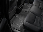 WeatherTech 05-13 Toyota Tacoma Crew Cab Rear Rubber Mats - Black installed in vehicle for optimal protection