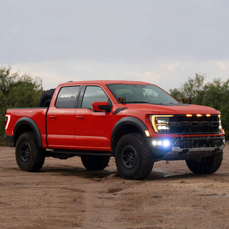Rigid Industries 2021+ Ford Raptor Triple Fog Lights Kit on red truck