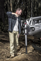 Man using ARB Hydraulic Recovery Jack for off road parts