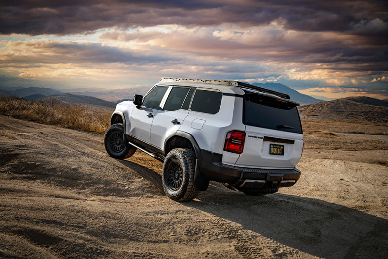 ICON 2024+ Toyota Land Cruiser 250 Series Front 2.5 VS IR Coilover Kit on off-road terrain