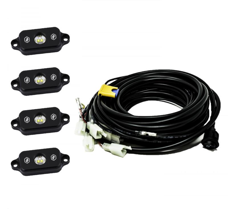 Baja Designs Universal Red Rock Light Kit with wiring harness and lights for offroad performance upgrades. Main image