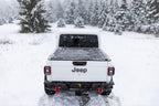 BAK 20-21 Jeep Gladiator Revolver X4s 5ft Bed Cover on snowy truck