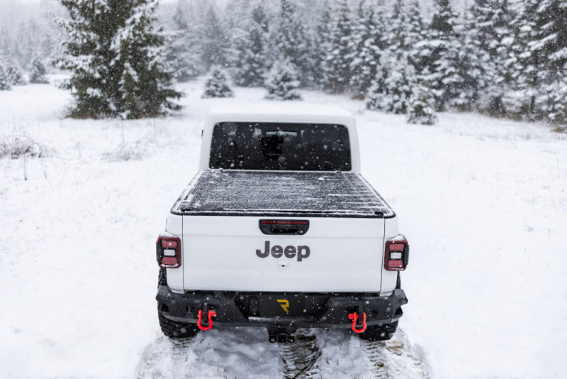 BAK 20-21 Jeep Gladiator Revolver X4s 5ft Bed Cover on snowy truck