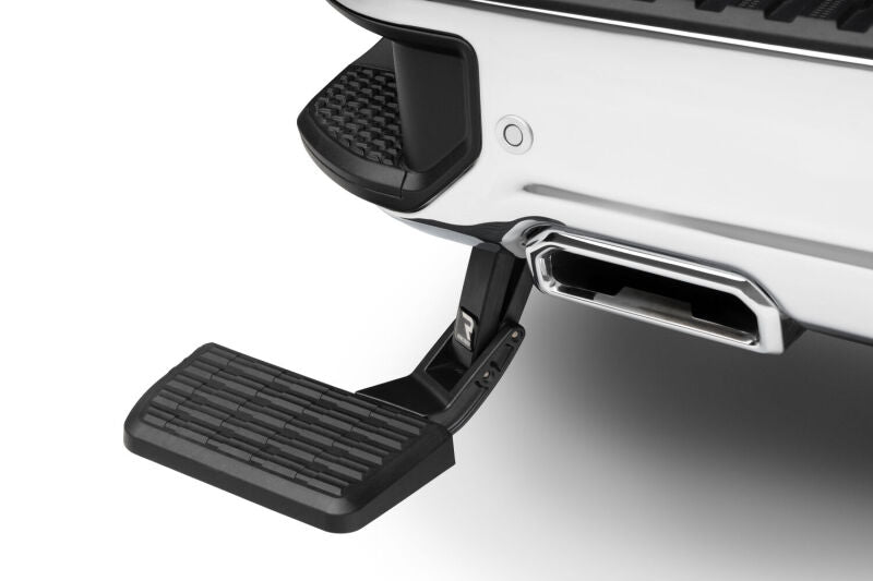 AMP Research 19-22 Chevrolet/GMC Silverado/Sierra 1500 BedStep - Black installed on truck rear bumper