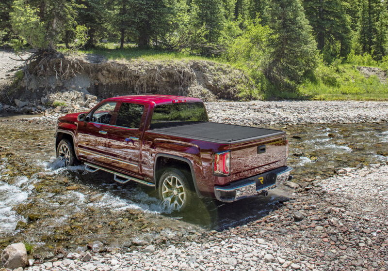 Retrax 2019 Chevy & GMC 5.8ft Bed 1500 RetraxPRO MX truck in creek, offroad parts and accessories.