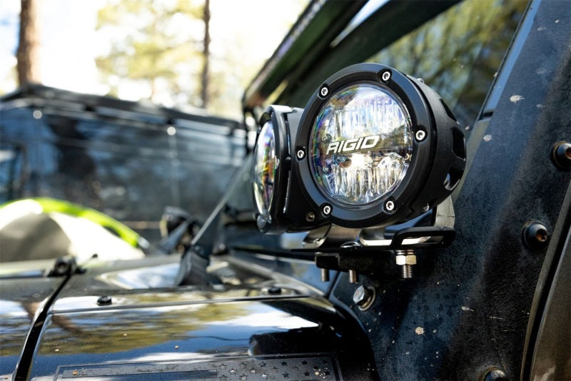 Rigid Industries 360-Series 4in LED Off-Road Drive Beam - RGBW (Pair) on truck roof for offroad lighting.