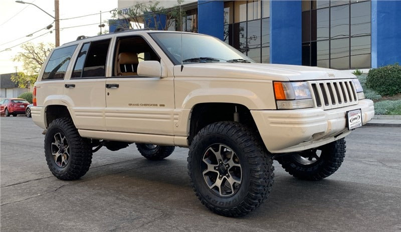 Lifted Jeep Grand Cherokee with offroad wheels and tires.