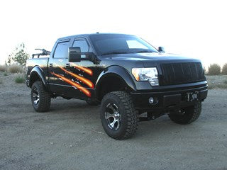 Off-road truck with suspension lift and performance upgrades